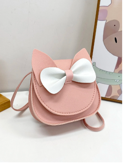 mini bolsa transversal é perfeita para as pequenas fashionistas. Feita de couro PU de alta qualidade, esta bolsa é durável e fácil de limpar, ideal para o uso diário de crianças. Seu design encantador